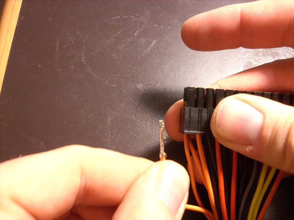 How to remove the pins from an ATX power supply with staples